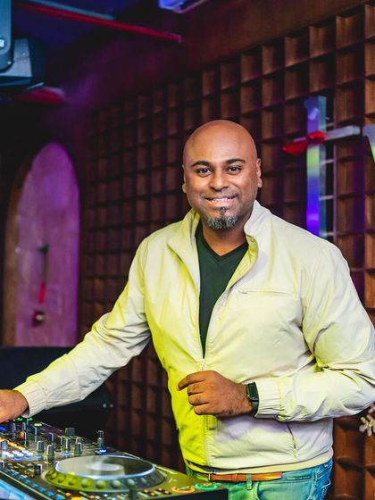 A smiling shot of me at the decks at TYD Hennur. I love the vibe at this venue and always have a great time playing for the energetic crowd.