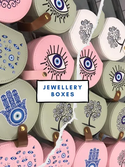 A collection of our evil eye and hamsa themed jewellery boxes. These unique designs offer a stylish way to store trinkets while adding a touch of protective charm.