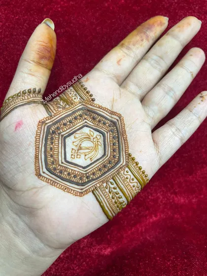 A close-up of the central hexagonal motif, showing the fine line work.