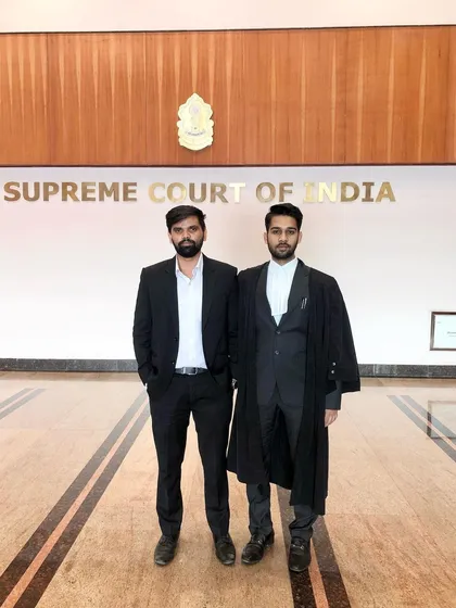 Inside the Supreme Court building with a colleague. Even in the most formal settings, the bond between our team members is evident.