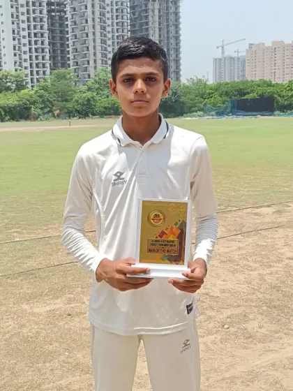 Ujjawal Saroj proudly holding his Best Bowler award after a fantastic performance in the U-16 tournament.
