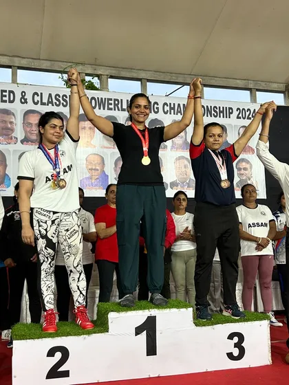 This is what winning looks like. Standing on the first-place podium at the National Masters Classic Powerlifting Championship. I don't just talk the talk, I walk the walk and bring home the gold.