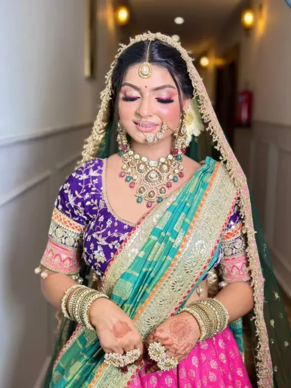 Eyes closed, you can appreciate the detail in the eye makeup. The blending is seamless, and the colors are vibrant yet elegant.