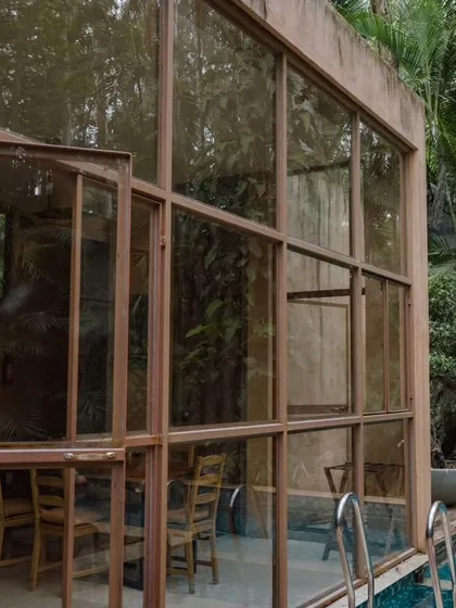 My private villas come with their own pool, surrounded by glass walls that bring the lush outdoors in.