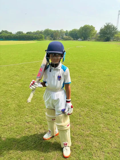 A confident pose from our little champion. The passion for cricket starts young.