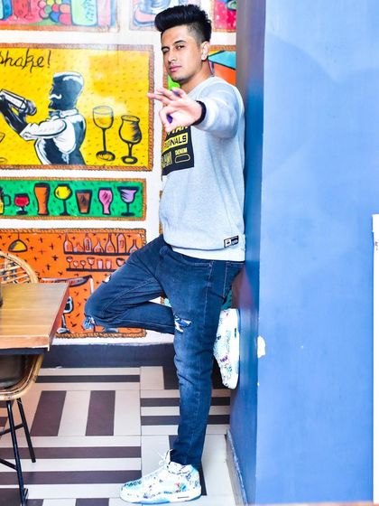 A full-length shot showing my personal style. I believe a DJ's image is part of the overall party experience.