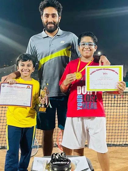 Hard work pays off. I love celebrating our players' achievements, like these young champions from our internal tournament. We believe in recognizing dedication with trophies, certificates, and of course, cake.