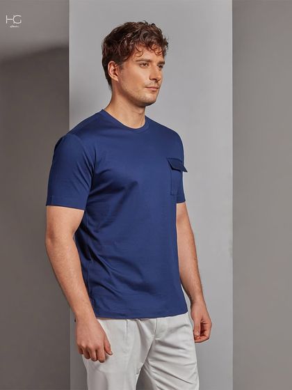 I believe in elevating everyday casuals. This premium navy blue t-shirt with a single flap pocket offers unmatched comfort without sacrificing style.