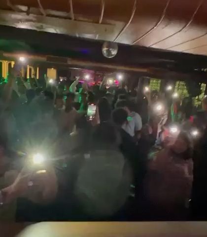 A closer look at the crowd with their phone flashlights up, fully immersed in the music. This is the connection I build with the audience through my set.