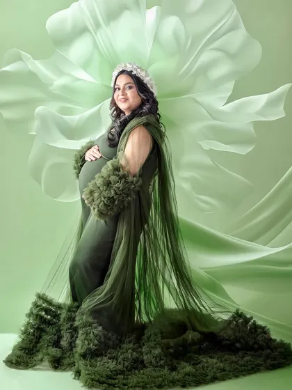 A creative edit using the green gown, with a digital floral effect that seems to bloom from the dress itself. This is an example of the fine art editing I offer.