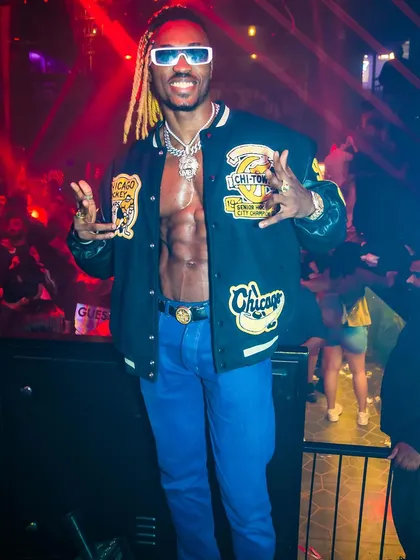 A guest showing off his impressive physique and style.