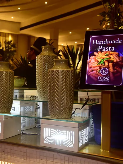 Our "Handmade Pasta" station, elegantly advertised with a digital display. We bring exceptional global flavors to every event, meticulously crafting each dish to elevate the moment.