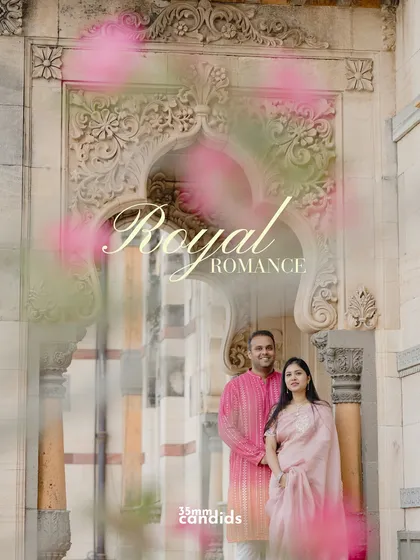 A creative shot with a pink color flare, titled "Royal Romance." This adds a dreamy, artistic touch to their palace pre-wedding portraits.