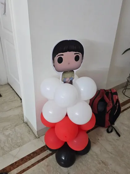 Another character balloon pillar from the 'Stranger Things' party, featuring a different character from the popular show.