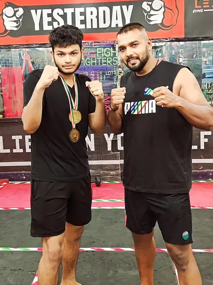 A proud coach with his champion. This is what we work for.