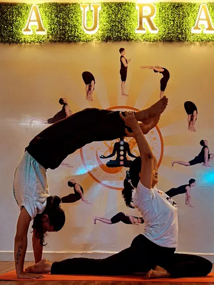 Yoga is a dance between strength and surrender. With practice and trust, you can achieve poses you never thought possible. This beautiful partner asana shows the balance and connection we cultivate at our centre.