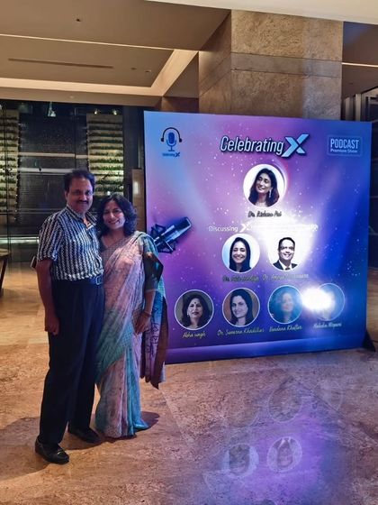 With my husband at the 'Celebrating X' podcast event. I am grateful for a partner who rejoices in my success and accolades.
