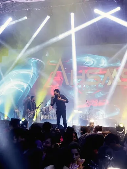 A wide shot of a concert-style performance by the band Ahsaas at a sangeet, showing my capability to cover large-scale productions.