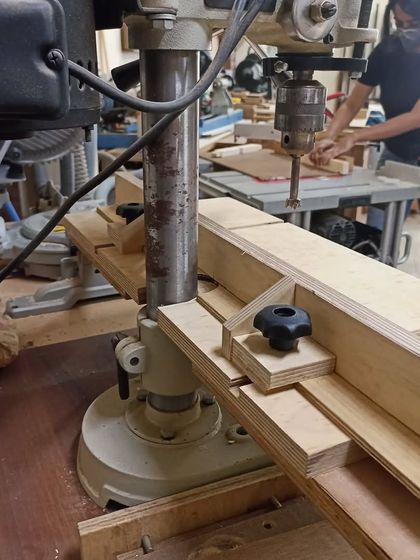 My new drill press table in action. The adjustable fence and stops allow for precise, repeatable drilling, which is great for making mortises.