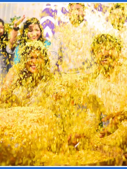 A full-blown flower shower. We make sure there are enough petals for everyone to join in and create this beautiful, chaotic, and happy mess.