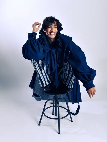 A candid, joyful moment from the couture shoot. It shows the versatility and personality I can capture even in a high-fashion setting.