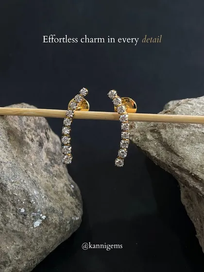 Effortless charm in every detail. These curved diamond bar earrings sparkle just enough to catch the light and tell your story, proving that simplicity is the ultimate sophistication.