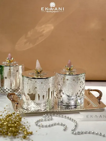 A set of my rose quartz-topped tea light holders on a matching tray. They create a beautiful, cohesive display of light and luxury, perfect for a festive centerpiece or a calming evening ritual.