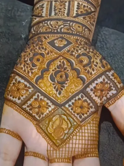 A beautiful and intricate back-of-hand design for a best friend's wedding. The geometric floral pattern is so eye-catching.