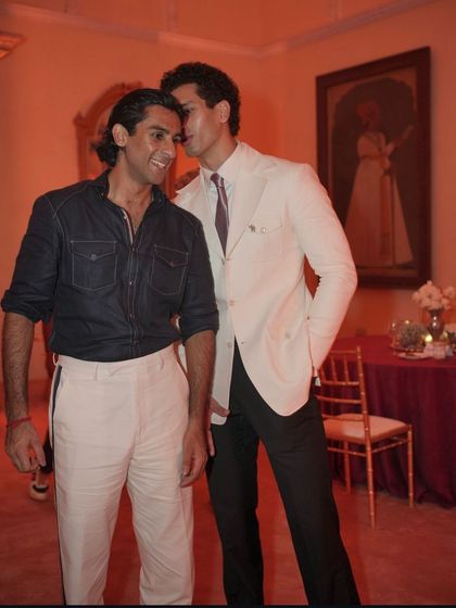 A candid moment from the U.S. Polo Assn. event in Jaipur, with our client looking sharp in his custom white linen suit.