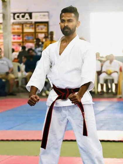 Focused and ready in my fighting stance during a national tournament. Competition is the ultimate test of practice and preparation.