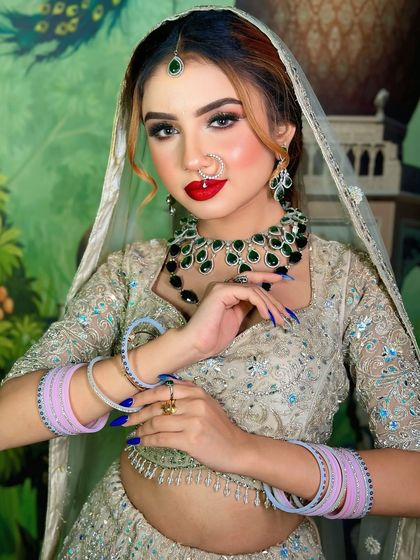 The same look with a classic red lip. This shows how easily a look can be transformed by just changing the lipstick color.