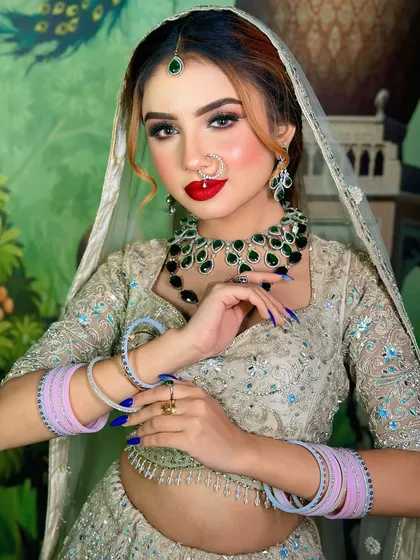 The same look with a classic red lip. This shows how easily a look can be transformed by just changing the lipstick color.