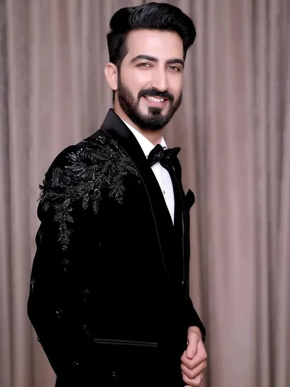 A sharp and confident reception look. I styled the hair and used professional makeup from MAC to define his features for a modern, camera-ready finish that's perfect for the party.