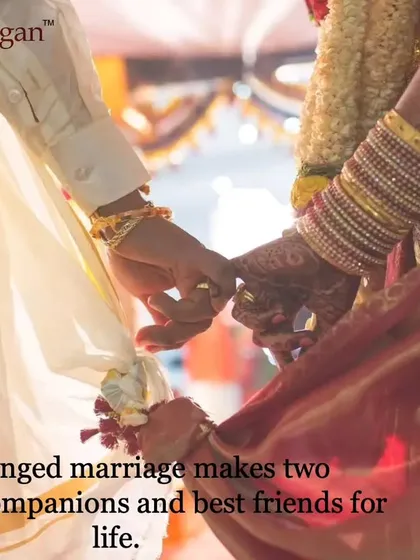 A couple holds hands during a wedding ritual, their garments tied together. Our service aims to turn two strangers into companions and best friends for life.