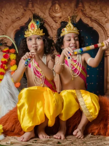 Dressed as Krishna, playing the tunes of joy. This twins photoshoot is a perfect example of our creative traditional themes.