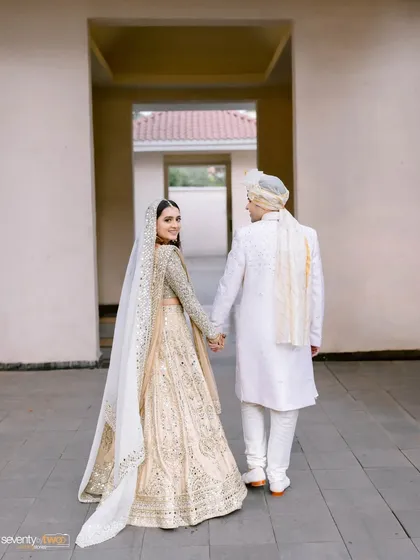 A beautiful moment as Vritti and Parth walk hand-in-hand at Radisson Alibaug. She took a leap of faith to meet him, and their seven-day love story culminated in this beautiful destination wedding.