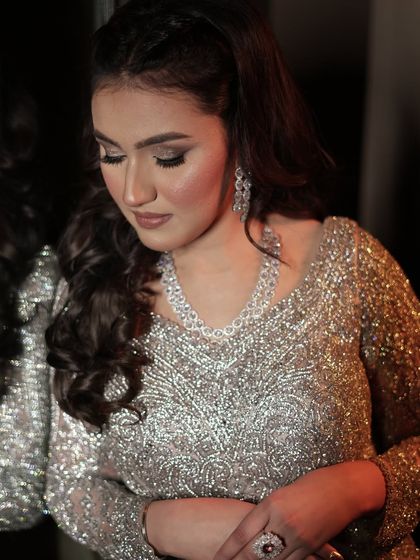 A close-up of the soft glam makeup. The focus is on beautiful skin and defined eyes.