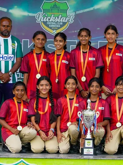 The pride of representing your school. Here is the Gopalan National School U-15 girls' team, crowned champions at our inter-school tournament, displaying their medals and trophy with honor.