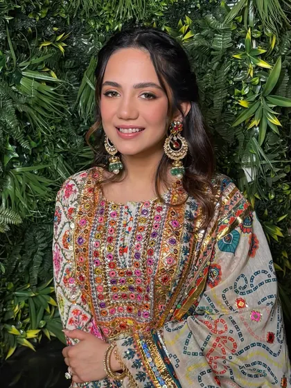As she rightly said, "Pooja ready but make it Poo." This sweet sister of the groom is ready for the wedding celebrations with a fun, glamorous, and festive look.