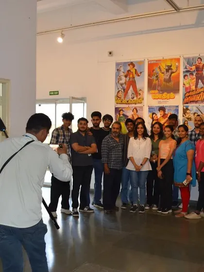 Students from ICAT Design & Media College posing for a group photo at the 'Southern Stars' exhibition, showcasing the show's appeal to a younger generation of creatives.