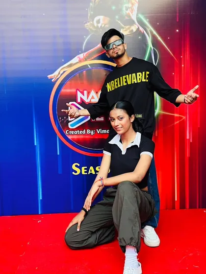 Another pose with a finalist. We focus on building not just dancers, but confident performers.