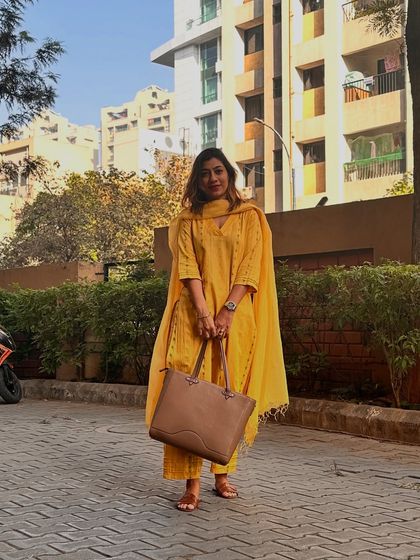 A photo of me in a yellow kurta set, representing a more traditional and feminine style personality.