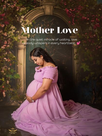 A solo portrait capturing a mother's quiet love as she looks down at her bump. The floral backdrop creates a secret garden feel.