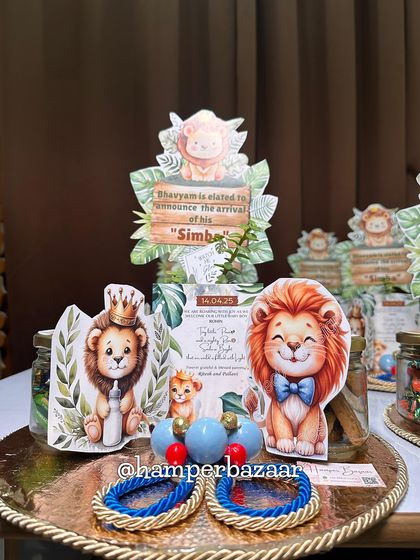 This hamper celebrates the new baby 'Simba' and his big brother Bhavyam, making it a gift for the whole family.