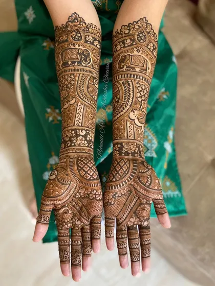 A bridal design featuring elephant motifs. The intricate patterns and symbolic elements create a beautiful and traditional look.