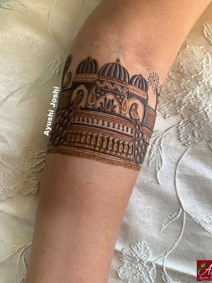 The initial sketch of the palace armband on the skin, the blank canvas before the art begins.