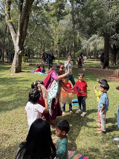 Another action shot of our scarf dance, showing how we use the whole outdoor space for our activities. This is what immersive, active storytelling looks like.