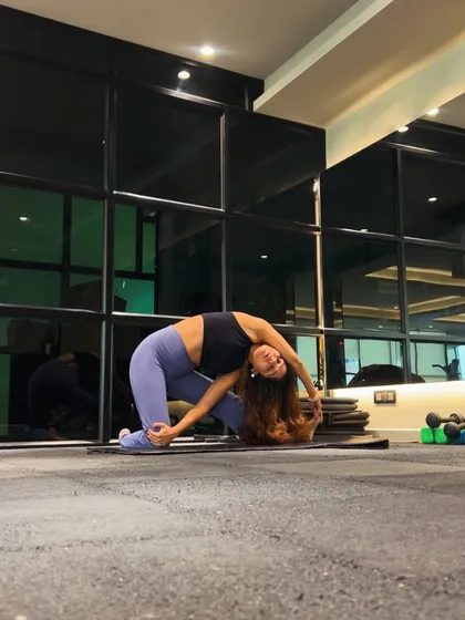 This is a variation of a side-bending pose, great for stretching the obliques and improving spinal flexibility. It's a perfect example of how I blend yoga into functional training.