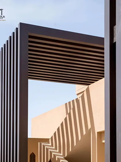 This bold, architectural structure demonstrates a highly modern approach to a pergola or carport. The strong vertical and horizontal lines create a powerful design statement, showcasing our custom fabrication capabilities.
