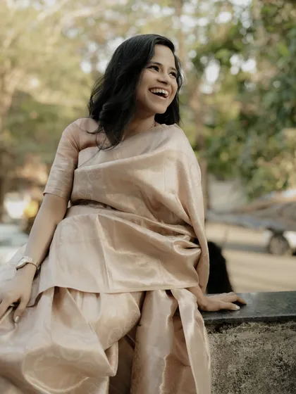 A moment of pure, uninhibited laughter. This candid shot captures the subject's joyful spirit.
